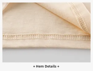 Détails de l'ourlet et de la texture douce du tricot en coton du haut beige en gros plan