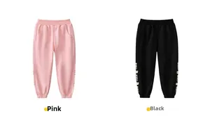 Detail of pink and black kids joggers with WISELY bear print and ribbed ankle cuffs