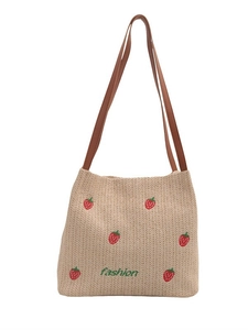 Borsa a spalla in paglia beige intrecciata con ricami di fragole e manici in pelle marrone