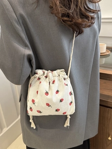 Cute strawberry print mini corduroy bucket bag with drawstring and woven shoulder strap
