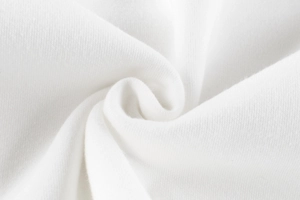 Close-up of soft white fleece fabric texture for children sweatshirt material