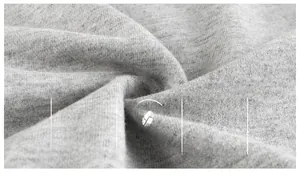 Close-up of soft grey fleece fabric texture for children's thermal sports pants