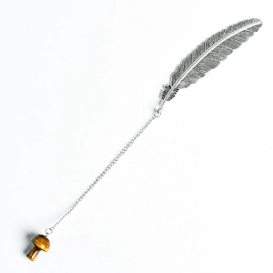 Vintage silver feather bookmark featuring a natural tiger eye stone mushroom pendant