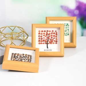 Three square wooden frames featuring crystal gemstone blossom trees with BLOSSOM text