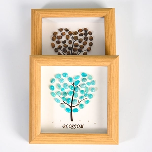 Artistic wooden frames with heart-shaped crystal stone mosaics and Blossom text