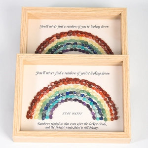 Handcrafted rainbow stone art in light wood frame with inspirational quote