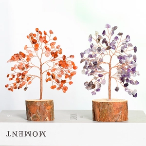 Natural crystal bonsai trees with red and purple stone leaves on rustic wood base