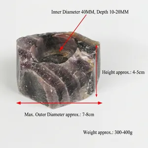 Natural purple fluorite crystal candle holder with unique striped hexagonal design