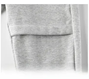 Detail shot of Fortunate Son logo printed on gray fleece sweatpants for kids