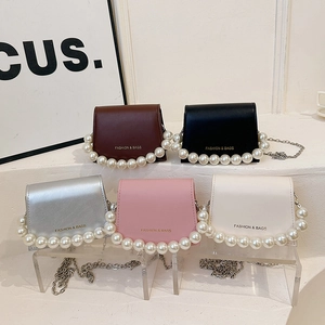 Mini flap crossbody bag with pearl handle and chain strap in five stylish colors