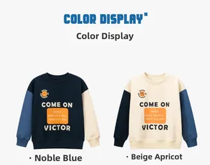 Detail of color-blocked kids sweatshirt with ribbed cuffs and inspirational slogan print