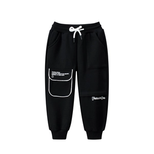 Kids black fleece joggers with elastic waist and white drawstrings in a sporty style