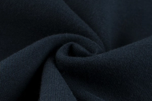 Macro texture of navy blue high-density knit cotton fabric for kids sweatshirt