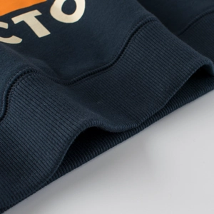 Kids navy cotton sweatshirt with ribbed cuffs and orange graphic print detail