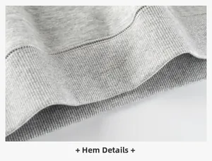Detailed close-up of the ribbed hem on this gray children fleece sweatshirt