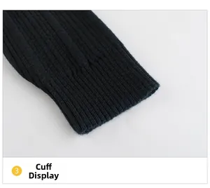Detailed macro view of black knitted sweater ribbed cuffs showing fine elastic texture