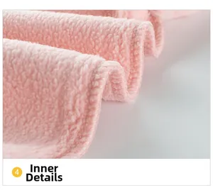 Close-up of soft pink fleece lining and neat stitching on kids winter sweatshirt