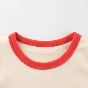 Kids cotton short sleeve T-shirt with a red ribbed crew neck and beige knit fabric