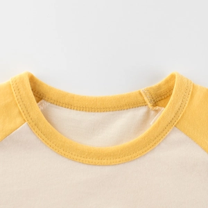 T-shirt en coton pour enfant avec col rond côtelé jaune et maille crème de qualité