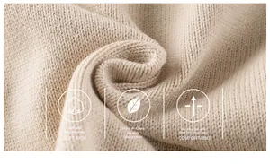 Close-up of soft beige knit fabric featuring breathable texture and Grade A safety quality