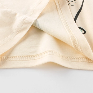 Short sleeve beige cotton T-shirt for girls featuring premium double-needle hem stitching