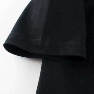Kids black cotton short sleeve T-shirt featuring high-quality double-stitch sleeve details