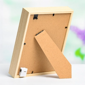 Back view of wooden light-up photo frame with battery box and adjustable stand