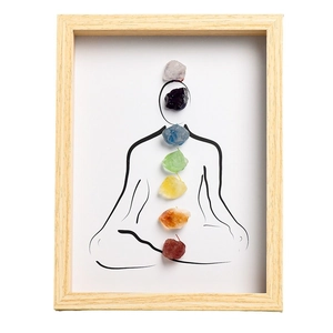 Minimalist wood frame wall art featuring seven chakra raw crystals and meditation line art