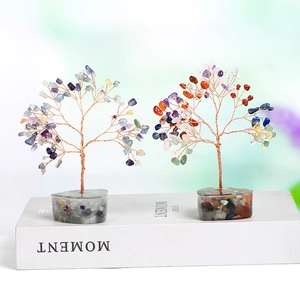 Pair of natural crystal money trees with heart-shaped stone base and colorful gemstone leaves