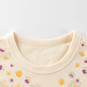 T-shirt en coton crème pour fille avec motifs floraux et col rond côtelé de qualité