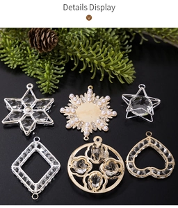 Close-up of clear acrylic snowflake and droplet pendants with gold and silver alloy finish