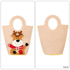 Detail of Christmas reindeer gift bag with felt applique and stitched cutout handles
