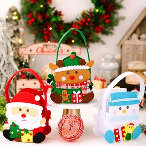 Three festive Christmas felt gift bags with Santa, reindeer and snowman character designs