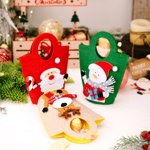 Detailed view of three festive felt Christmas gift bags with Santa, snowman and reindeer
