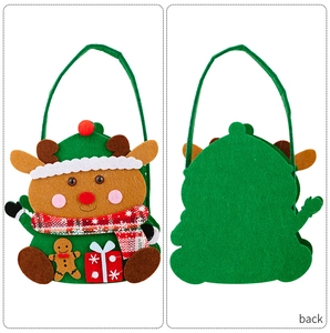 Detail of felt reindeer Christmas gift bag with gingerbread man and festive patterns