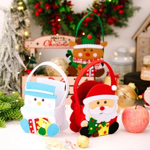 Detailed view of handmade felt Christmas gift bags with 3D Santa and reindeer designs