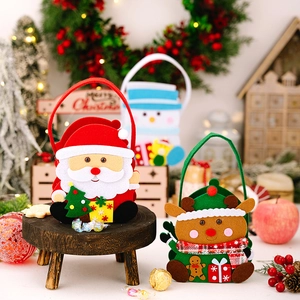 Detail of felt Christmas gift bags featuring 3D Santa and Reindeer with festive decor