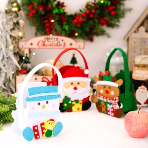 Felt Christmas gift bags featuring snowman, Santa, and reindeer in a festive setting