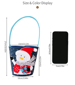 Blue denim Christmas gift bag with snowman pattern and specific size dimensions shown