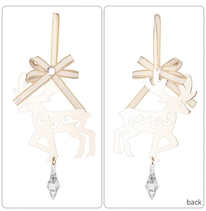 Detail of reindeer Christmas ornament with cream hollow design and crystal pendant