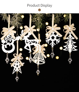 Set of white Christmas ornaments including reindeer and snowflake with crystal drop detail