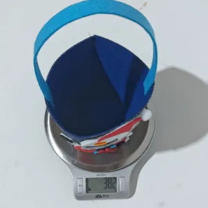 Detailed view of lightweight blue denim snowman gift bag weighing 38.2g on a scale