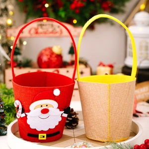 Detail view of felt Christmas gift bags with Santa Claus patch and festive decor