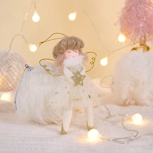 Detailed view of pink plush angel ornament with golden star and wings for Christmas tree decor