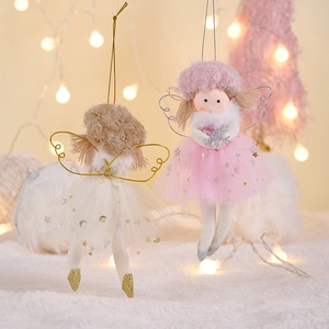 Detail of pink and white plush angel ornaments with sequined mesh dresses for Christmas tree