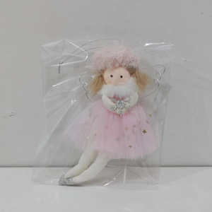 Detailed view of pink angel ornament with gold star mesh skirt and silver wings