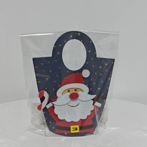 Christmas gift bag featuring 3D Santa Claus and gold stars on navy blue felt fabric