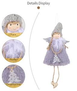 Detail display of pink angel ornament with plush fabric, silver wings and wood beads