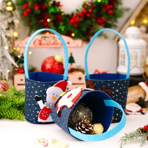 Three Christmas denim gift bags with snowman, Santa, and reindeer icons on festive background