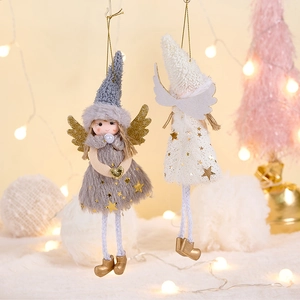 Detail of plush Christmas angel ornaments with knit hats and golden sequin stars